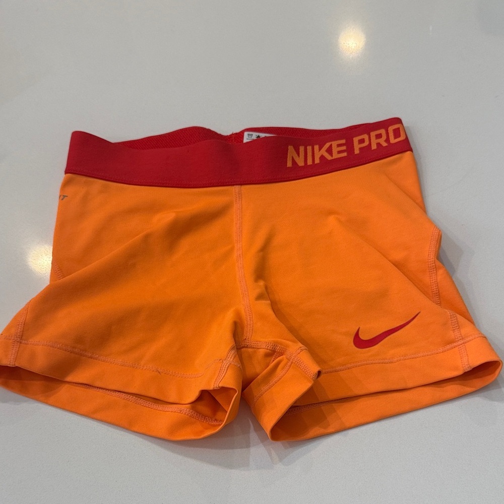 Nike Pro Orange Athletic Shorts with Red Waistband